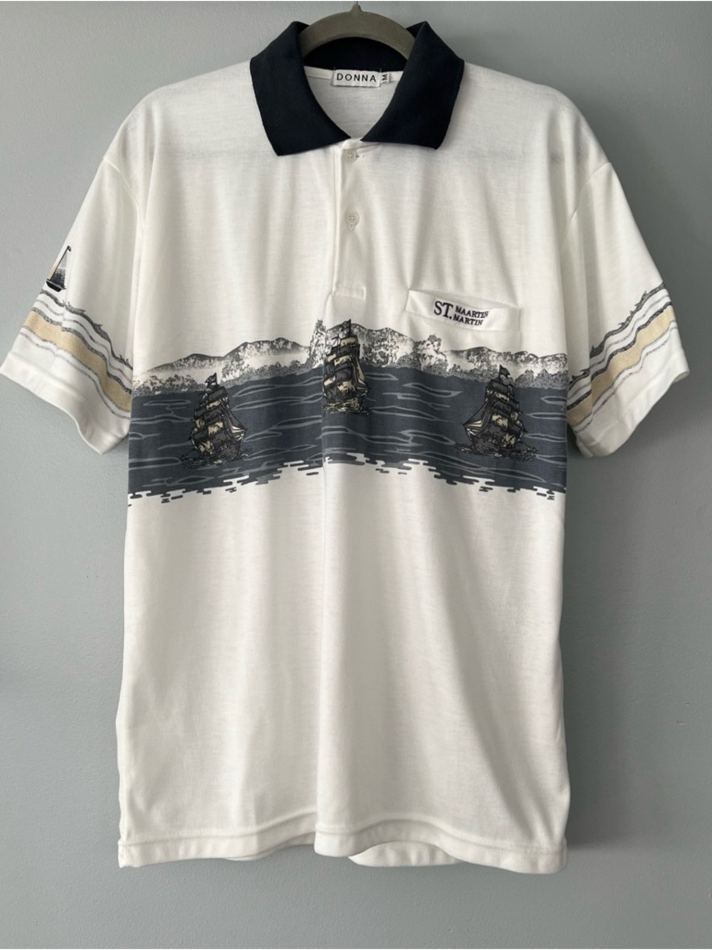 Donna White Polo with Navy Collar and Nautical Ship Graphic and St. Martin Logo